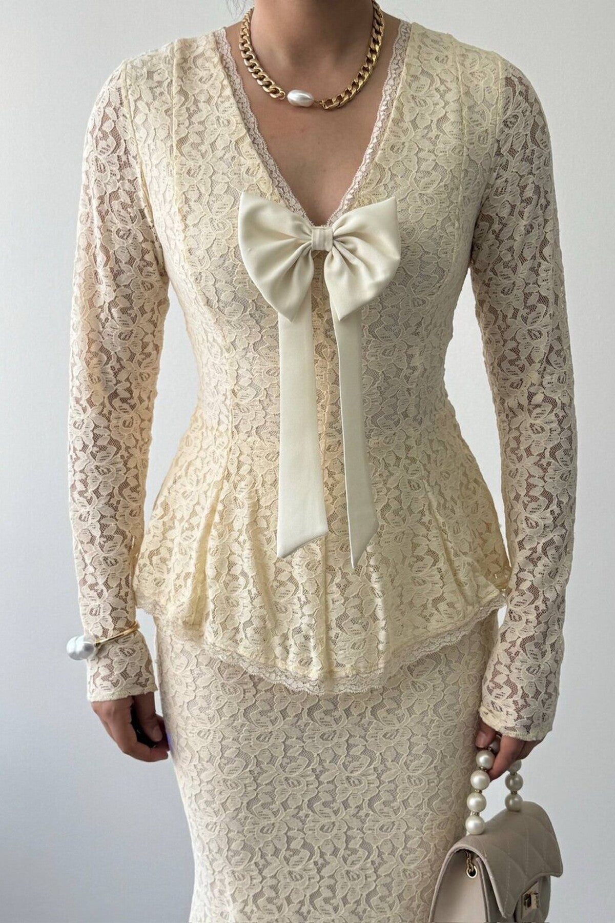 Lace Peplum Dress with Bow Detail
